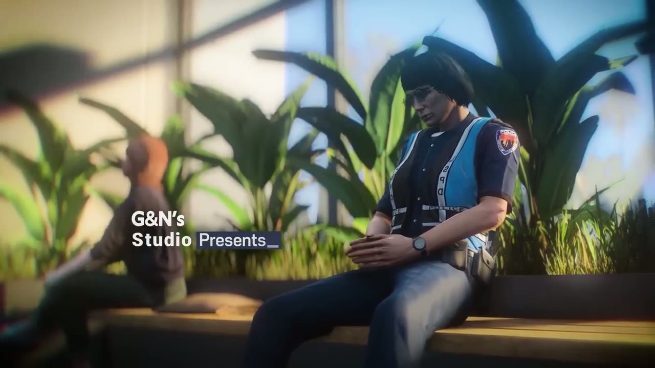 Cinematic frame from the Vespucci Police Department GTA V trailer showing an officer in the station lobby